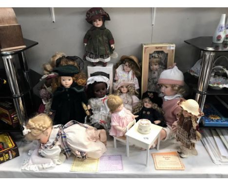 A collection of dolls including porcelain example &amp; a Chiltern black baby doll