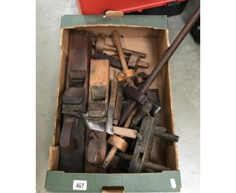 A box of old woodworking tools