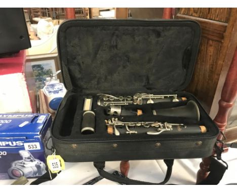 A cased Prelude Conn-Selmer clarinet.