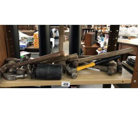 A shelf of hammers