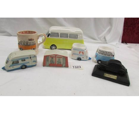 A VW camper money box, a VW camper mug, 2 VW camper egg cups, caravan/tent salt &amp; pepper pots and an Auto Collection Morr