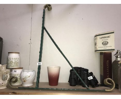 A large metal wall lamp bracket