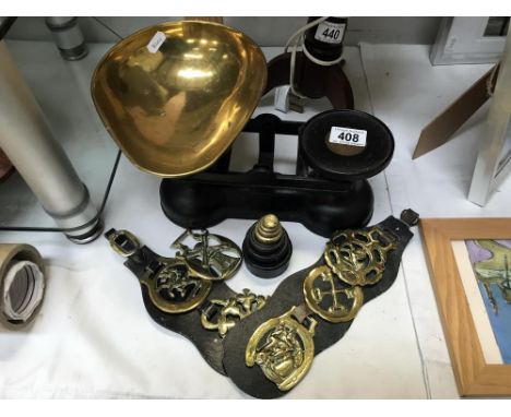 A set of kitchen scales with weights &amp; a quantity of horse brasses