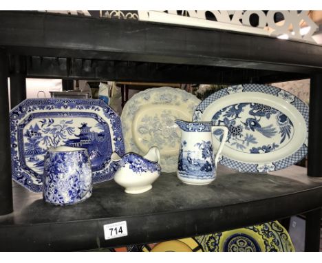 A shelf of blue and white china