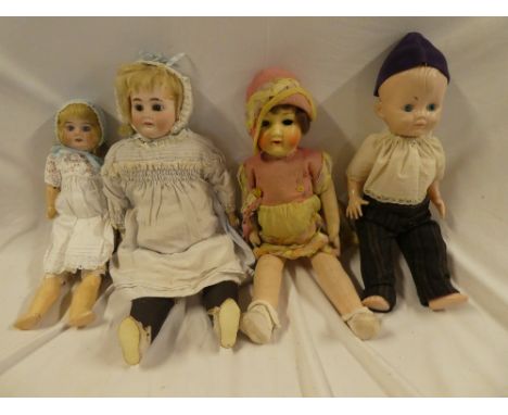 An old porcelain headed doll by Armand Marseille, marked "1894 AM.  5 dep"; a vintage cloth covered doll and one other compos