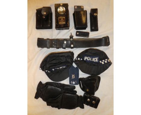 A Warwickshire Constabulary hand lamp, various Police belt, pouches and related items