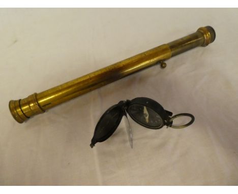 A First War Officers marching compass with folding back aperture and a brass adjustable gun sight (2)