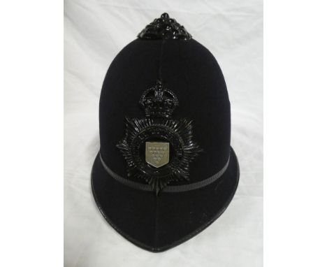 A George VI  Policeman's blue helmet of the Cornwall Constabulary with blackened Kings crown badge &amp; fittings