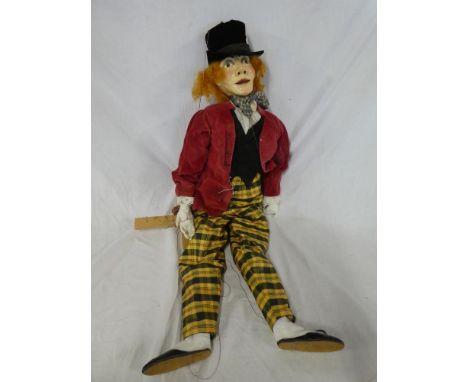 A large wooden jointed puppet depicting the Mad Hatter, 36" long