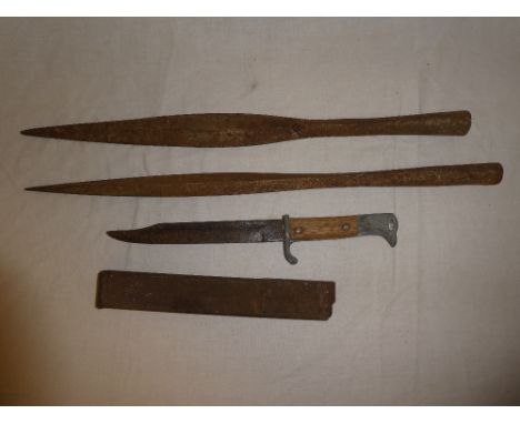 Two iron spear heads, a German bayonet and a painted metal magazine (3)