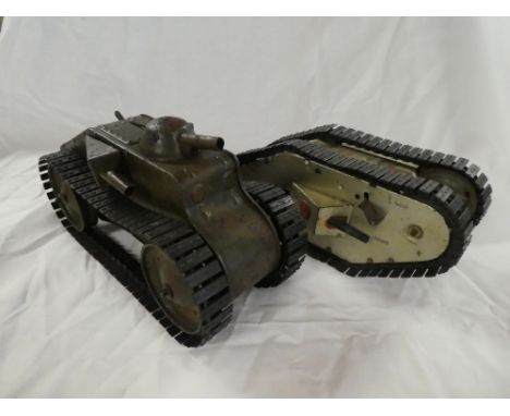 An early Tri-ang tin plate First War tank and a Marx clockwork First War tank (2)