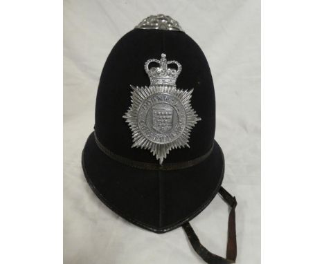 An EIIR post 1952 Policeman's blue helmet of the Cornwall Constabulary with chromium plated helmet plate and mounts