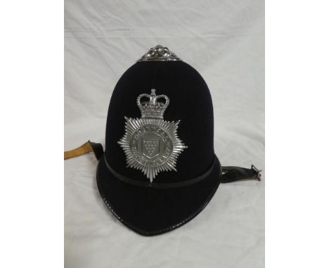 An EIIR post 1952 Policeman's blue helmet of the Cornwall Constabulary with motorcycle side straps