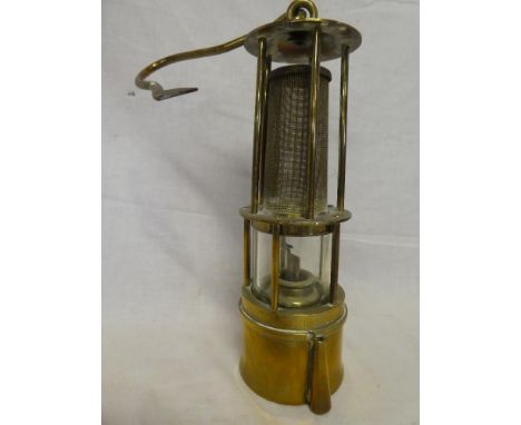 A brass Miner's lamp with exposed gauze body by Wilhelm Seippel of Dortmund