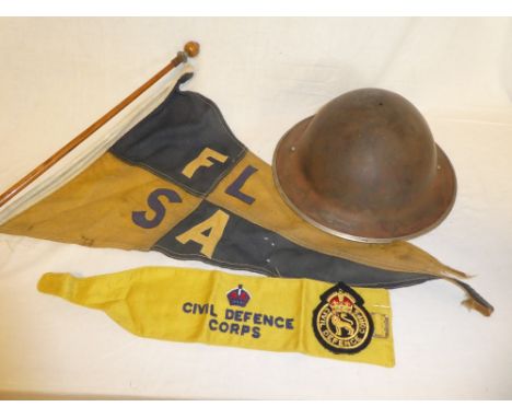 A British Second War steel helmet dated 1939, Falmouth Little Ships Association boat pennant, Civil Defence Corps armband and