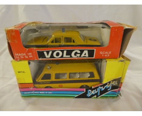 A Russian 1:43 scale nine-seater mini-bus and similar four door saloon, boxed (2)