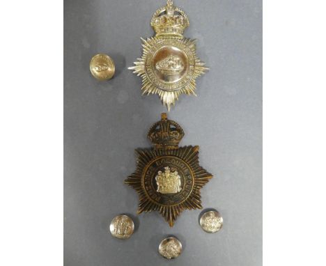 A collection of Penzance Borough Police badges including chromium plated Kings Crown helmet plate of Penzance Borough Police 