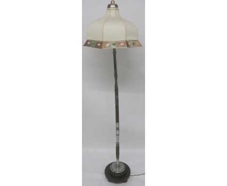 AN ART DECO CHROMED STANDARD LAMP the octagonal shade with silver plated and gem set rim and material body, 188cm high Condit