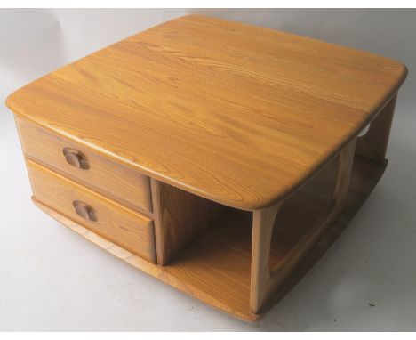 AN ERCOL PANDORA COFFEE TABLE with two drawers, 40cm high x 80cm wide x 80cm deep Condition Report: Available upon request