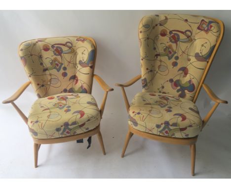 TWO ERCOL WINDSOR ARMCHAIRS with original Ercol cushions, 104cm high and 83cm high (2) Condition Report: Available upon reque