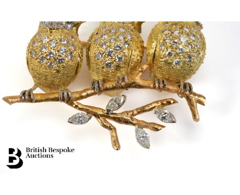 A charming bespoke 18ct yellow rose diamond and ruby gold brooch. The brooch depicting three little birds seated on a branch,