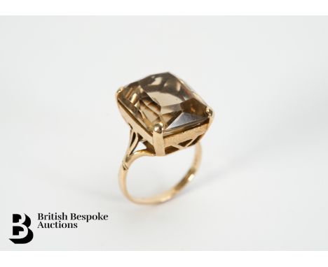 Vintage 9ct gold topaz ring. The ring set with a step-cut topaz 16 x 14mm, size L+, 6.73 gms.&nbsp;Condition ReportSlight wea