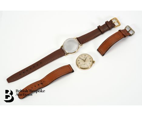 Vintage gentleman's 9ct gold Smiths De Luxe wrist watch, having a champagne face with an Arabic dial and subsidiary second di