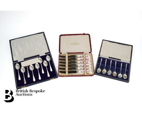 A boxed set of silver Jubilee silver spoons, each spoon marked with the city where the spoon was assayed, dated 1977, the bac