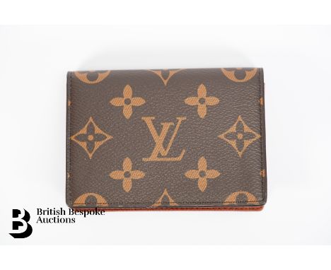A Louis Vuitton card wallet, in Louis Vuitton's iconic monogram canvas, approx 10.5 x 8 cms. The inside contains a pocket for