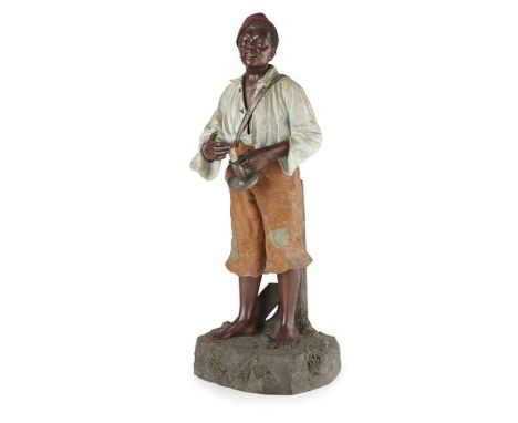 JOHANN MARESCH AUSTRIAN POLYCHROME DECORATED TERRACOTTA FIGURE OF A BOY, CIRCA 1900 modelled holding a pewter chamber stick a