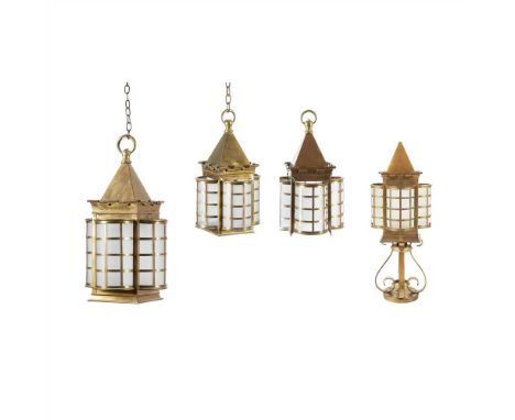 ENGLISH SCHOOL GROUP OF THREE ARTS &amp; CRAFTS BRASS HANGING LANTERNS, CIRCA 1900 each with prism pediments with castellated