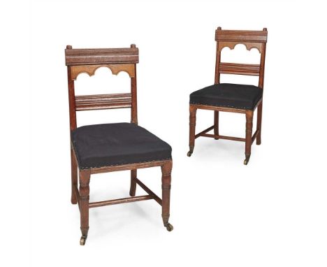 GEORGE EDMUND STREET (1824-1881) PAIR OF GOTHIC REVIVAL OAK SIDE CHAIRS, CIRCA 1860 the top rails with horizontal mouldings w