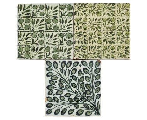 WILLIAM DE MORGAN (1839-1917) PAIR OF 'BERRIES &amp; LEAVES' GREEN-GLAZED TILES, 1872-1881 one with marks for Poole pottery, 