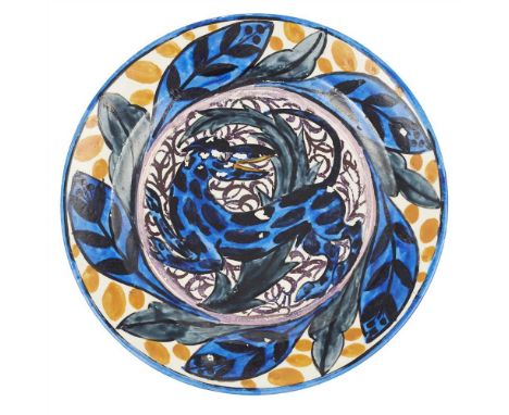 JOHN PEARSON (fl. 1885-1910) PAINTED CERAMIC PLATE., CIRCA 1910 decorated with a central mythical creature amongst stylised f