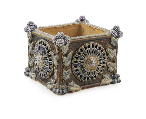 DOULTON &amp; CO., LAMBETH STONEWARE JARDINIÈRE, DATED 1877 of square form, carved in high relief with stylised foliate round