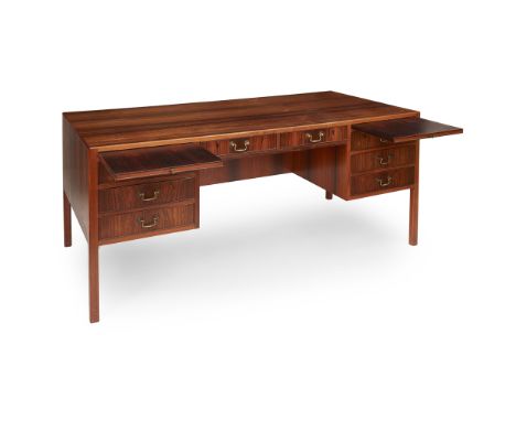 Y OLE WANSCHER (1903-1985) FOR A. J. IVERSEN, DENMARK ROSEWOOD WRITING DESK, CIRCA 1950 the rectangular top raised above two 