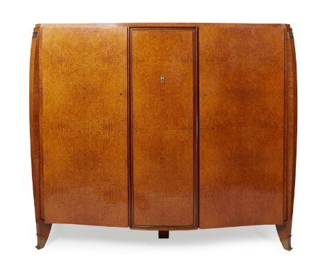 JULES LELEU (1883 –1961) ART DECO BURR WALNUT ARMOIRE, 1930S with three doors, enclosing a fully veneered and fitted interior