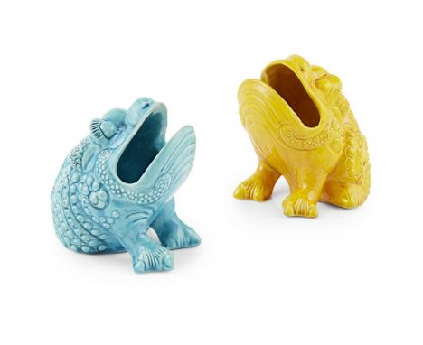 BURMANTOFTS POTTERY, LEEDS TWO SPOON WARMERS, CIRCA 1890 each moulded as a toad grotesque, in turquoise and yellow glazes, im