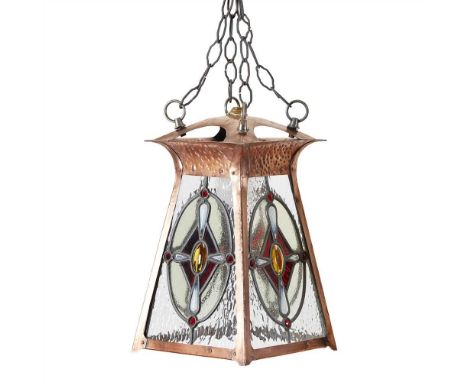 ENGLISH SCHOOL ARTS &amp; CRAFTS COPPER HANGING LIGHT, EARLY 20TH CENTURY of tapering square section form, with four glass pa