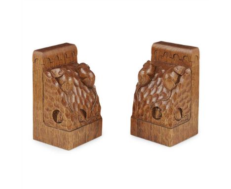 WORKSHOP OF ROBERT 'MOUSEMAN' THOMPSON PAIR OF OAK TRIPLE MICE BOOKENDS, CIRCA 1970 each carved with three mice, and with too