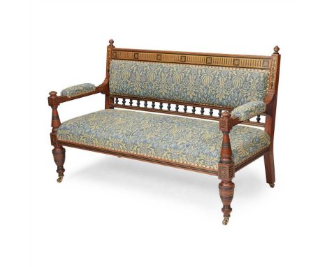 LAMB, MANCHESTER AESTHETIC MOVEMENT INLAID WALNUT AND EBONISED SETTEE, CIRCA 1880 the back with spindle gallery and inlaid wi