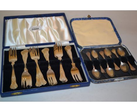 Set of twelve Sheffield silver cake forks together with a cased set of six silver Rat Tail pattern coffee spoons