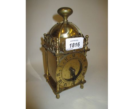 Small electric brass cased mantel clock in antique style, a Smiths two train mantel clock and a chrome plated lamp base mount