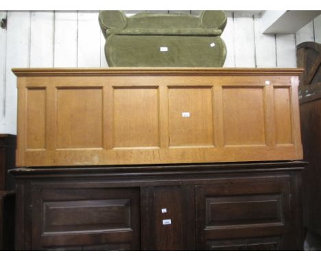 Large 20th Century light oak coffer with hinged lid above panelled front and sides