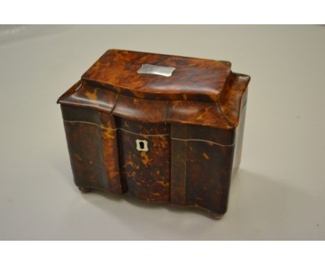 Late 18th / early 19th Century tortoiseshell two division tea caddy with white metal mounts and serpentine inverted break fro