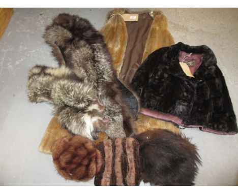 Early 20th Century mole skin stole with label for Scotch Hyganised Mole together with two further stoles, a fur coat inner li