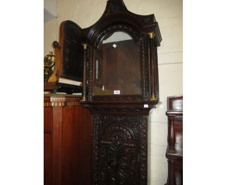 Antique oak longcase clock case with later carved decoration