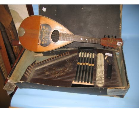 Rosewood inlaid mandolin and a boxed auto harp (a/f)