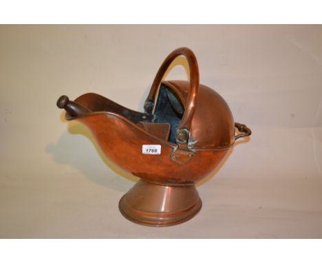 19th Century helmet shaped copper coal scuttle with shovel