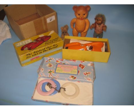 Jetex jet propelled model racing car with original box together with a small Steiff hedgehog figure, a Rosebud celluloid bear